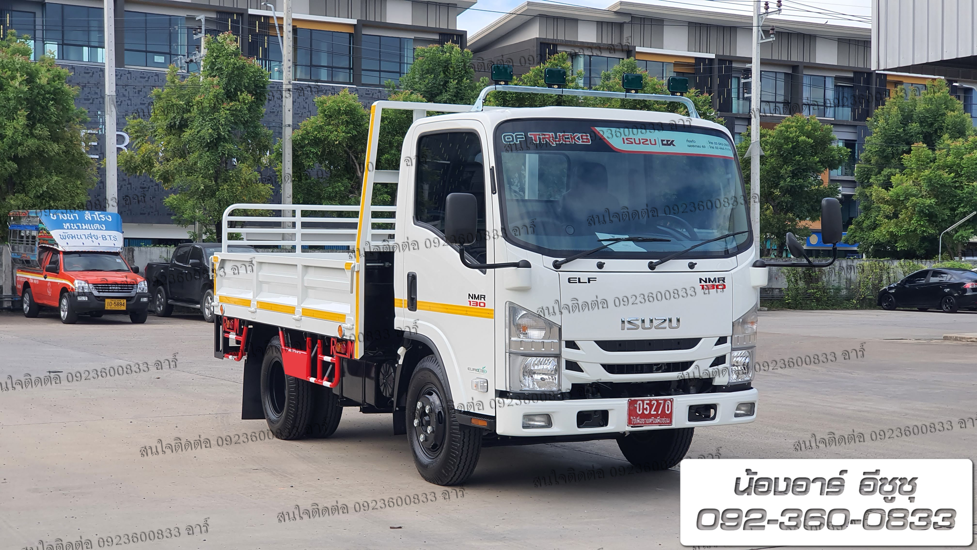 6 ล้อ ISUZU NMR130 แรงม้า กระบะเปิด 3 ด้าน (เพิ่มรั้วฝาท้าย)