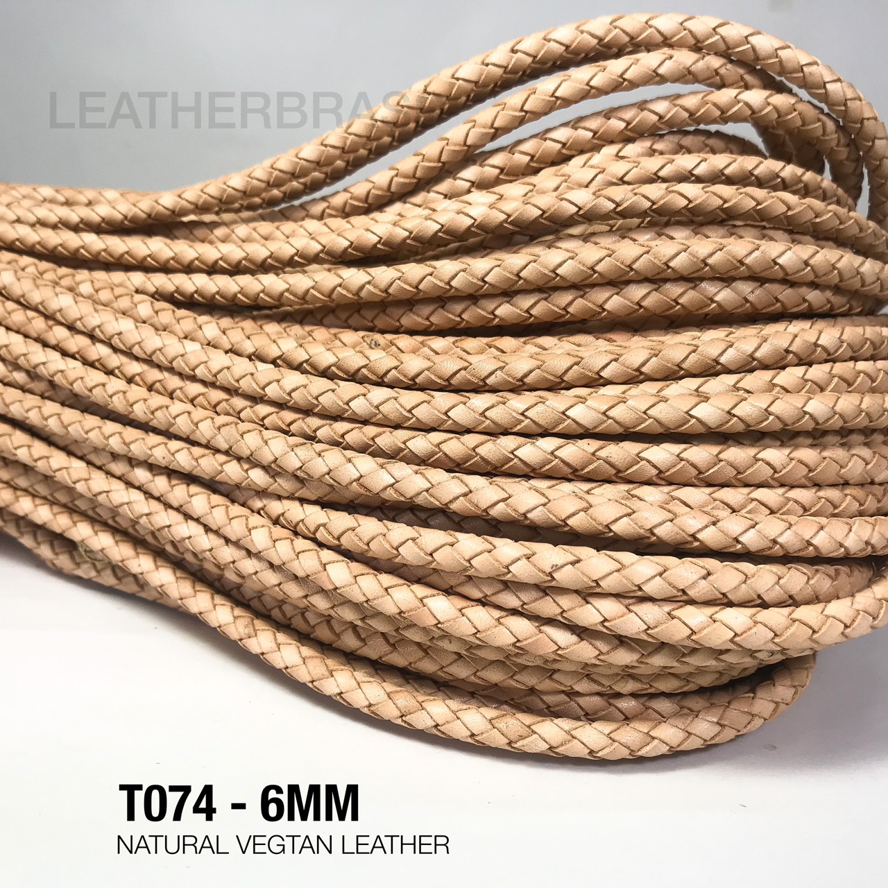 T074 เชือกถักหนังฟอกฟาด สีธรรมชาติ อุปกรณ์งาน DIY อุปกรณ์งานหนัง **ราคาต่อหลา** Leatherbrass
