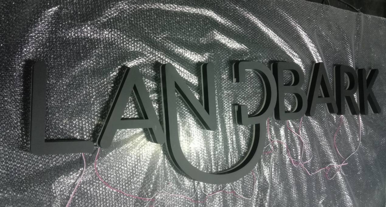 งานป้ายอักษรซิงค์ทำสีไฟออกหลัง