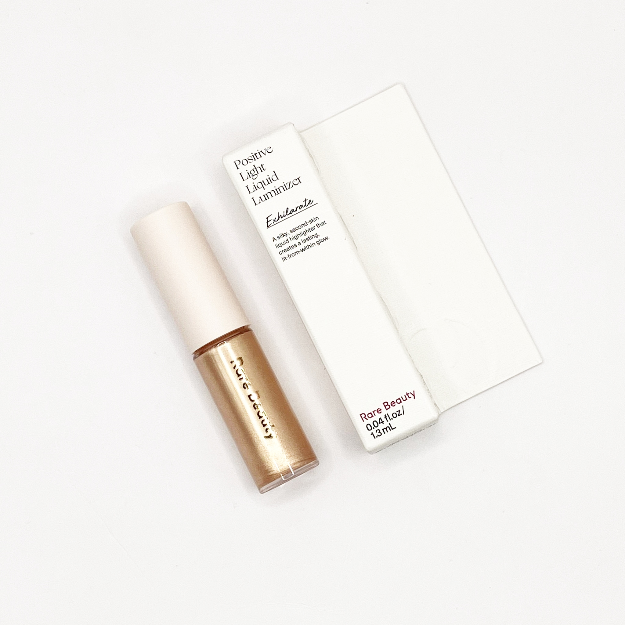 Rare Beauty Positive Light Liquid Luminizer 1.3ml สี Exhilarate ลิควิดไฮไลเตอร์