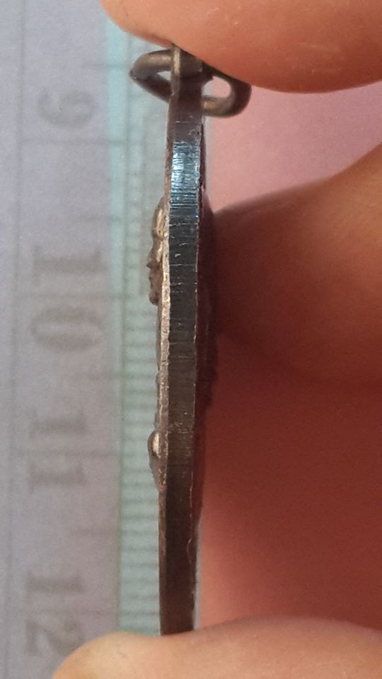 เหรียญ หลวงปู่ ทวด หลัง พระครู ศรัทธา นุรักษ์ พ่อท่านวัน วัดลอน พัทลุง ปี 2557