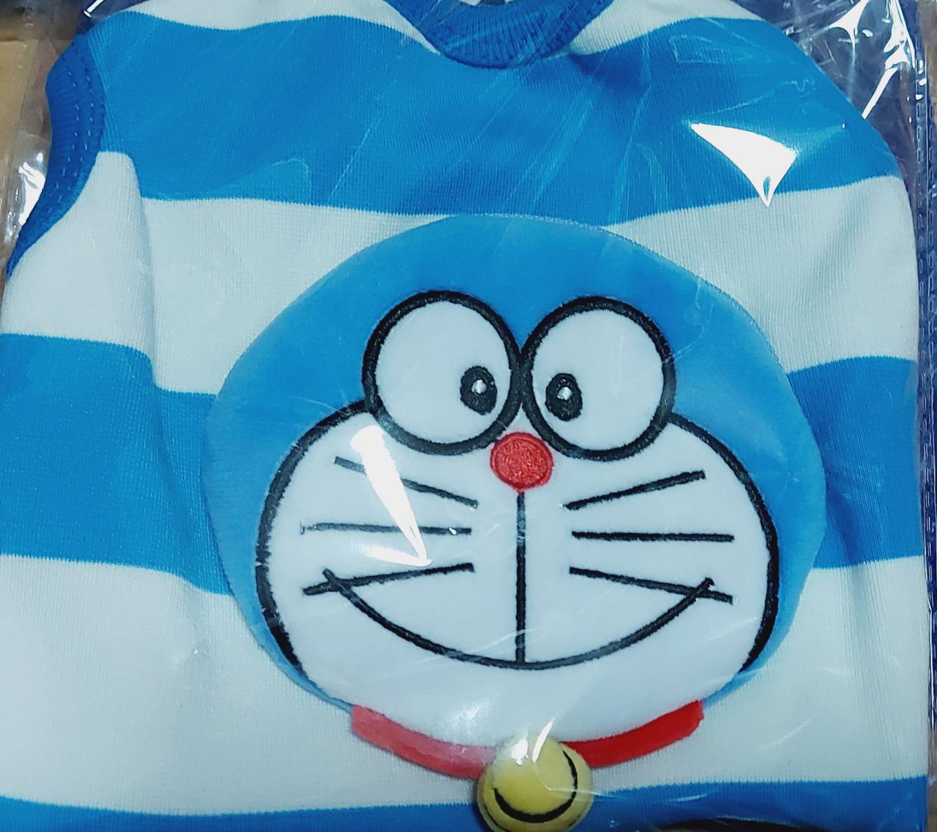 เสื้อแขนกุดลายโดเรมอน มีกระเป๋าหลัง ผ้าสำลีนุ่ม / ไซส์ M