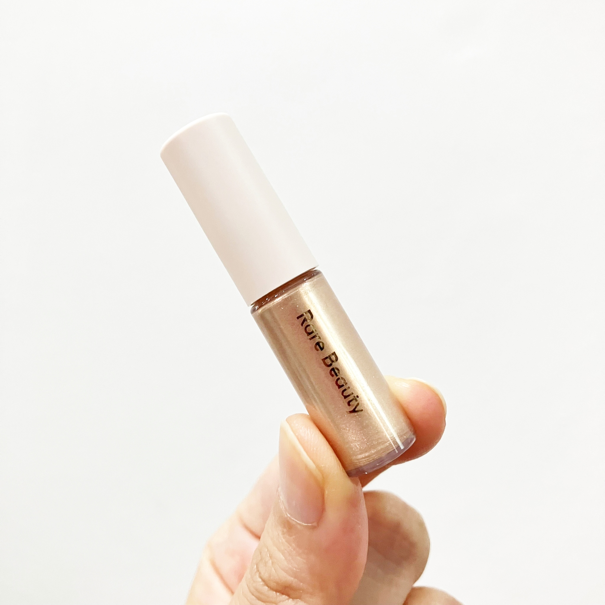 Rare Beauty Positive Light Liquid Luminizer 1.3ml สี Exhilarate ลิควิดไฮไลเตอร์