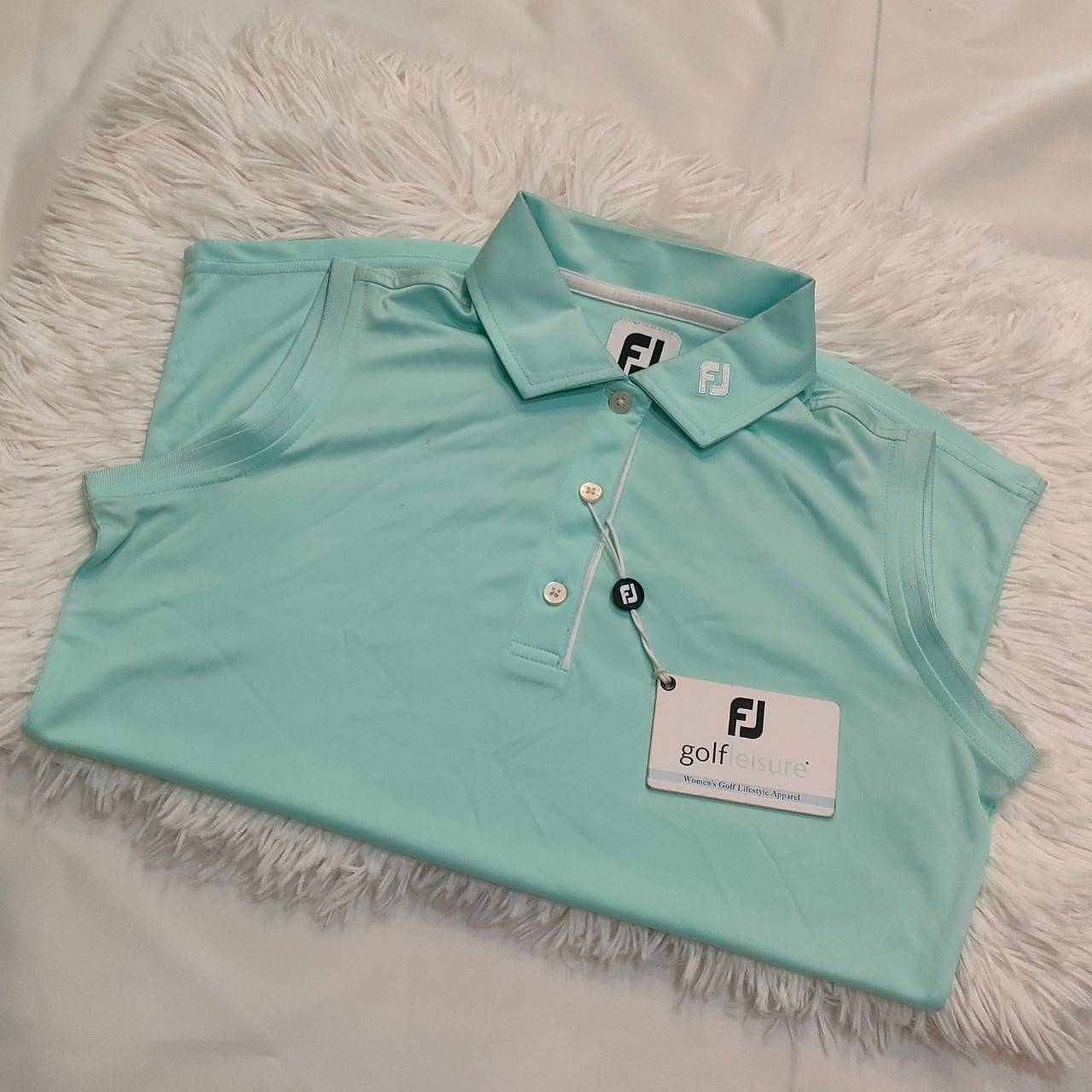 เสื้อ FootJoy Lady เสื้อแขนกุดสำหรับ นักกอล์ฟสุภาพสตรี สีฟ้า ขนาดไชส์ M แฟชั่นทันสมัย เก็บจากห้าง ลดล้างสต๊อค!!!