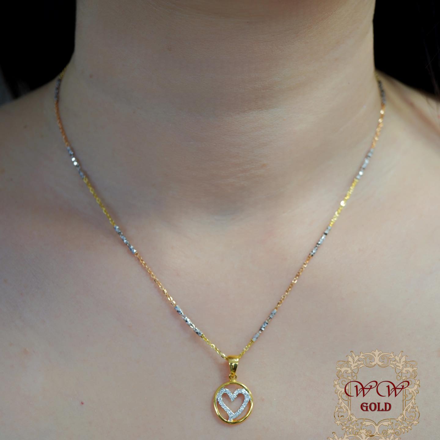 จี้หัวใจเพชรล้อมทอง