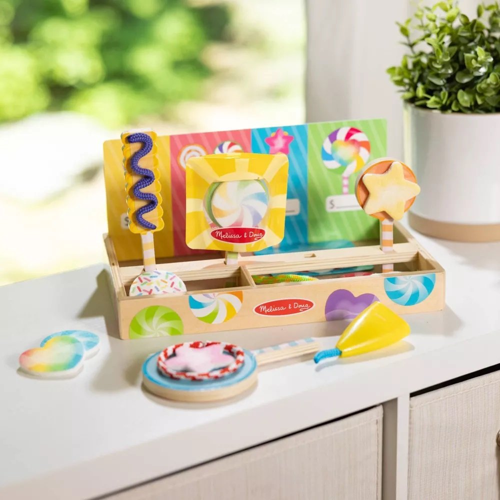เล่นทำอมยิ้มลอลลี่ป๊อบ Mix & Match ปากกาตกแต่งเชือกบนแผ่นหนึบ Melissa & Doug Lollipop Play Set