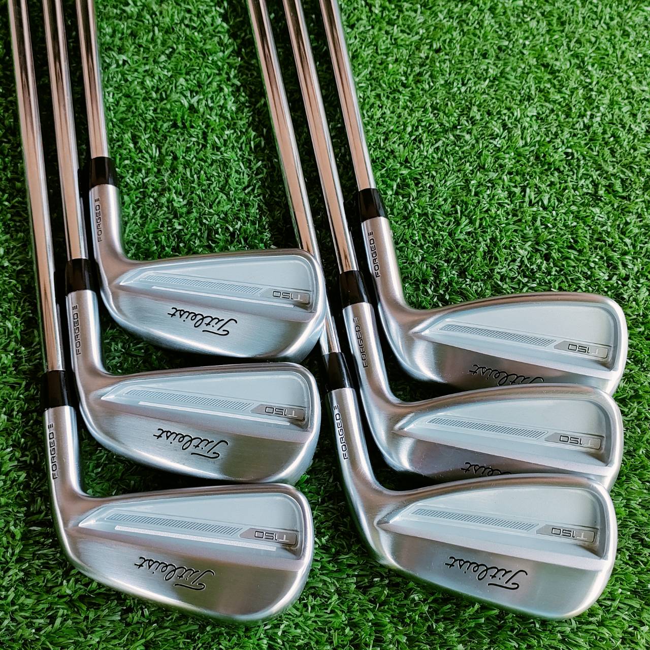 ชุดเหล็ก Titleist T150 Forged สภาพสวยนางฟ้า 98% ไดร์ฟไปแค่ 2 ครั้ง ความรู้สึกขณะปะทะลูกแบบ T100 แต่ ถูกออกแบบให้สร้างความเร็วได้สูงกว่า T100 และตีไกลกว่า มีองศาหน้าเหล็กชันกว่า 2 องศา ชดเชยความผิดพลาดมากกว่า ไม้กอล์ฟพรีเมี่ยมมือสอง ของแท้ By NakaraLuxurio