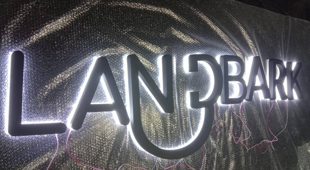 งานป้ายอักษรซิงค์ทำสีไฟออกหลัง