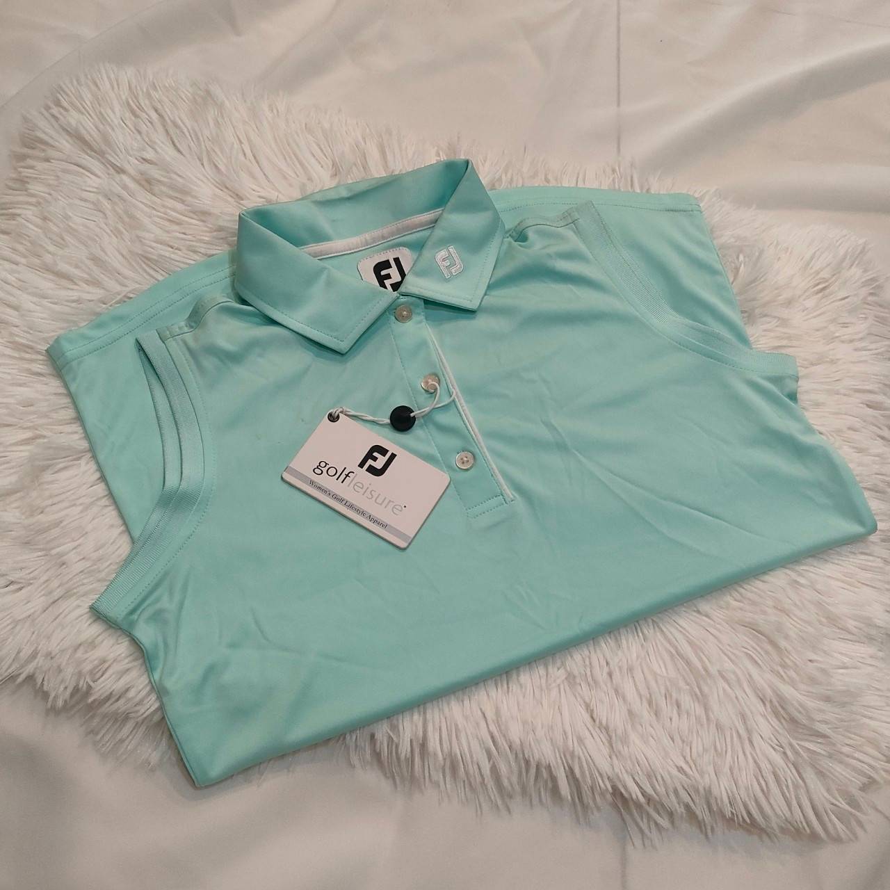 เสื้อ FootJoy Lady เสื้อแขนกุดสำหรับ นักกอล์ฟสุภาพสตรี สีฟ้า ขนาดไชส์ M แฟชั่นทันสมัย เก็บจากห้าง ลดล้างสต๊อค!!!