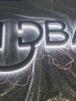 งานป้ายอักษรซิงค์ทำสีไฟออกหลัง