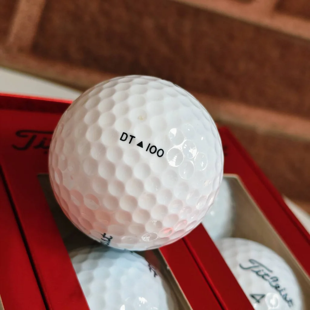 GOLF BALLS Titleist New DT 100 ลูกใหม่แกะกล่อง 1 โหล (12 ลูก)** 🏌️♂️🔥 GOLF BALLS Titleist New DT 100 ลูกใหม่แกะกล่อง 1 โหล (12 ลูก)** 🏌️♂️🔥
